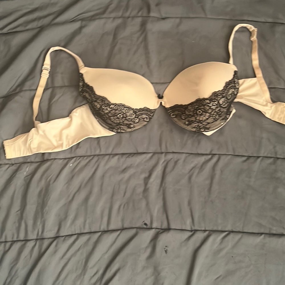 Tan and black laced bra